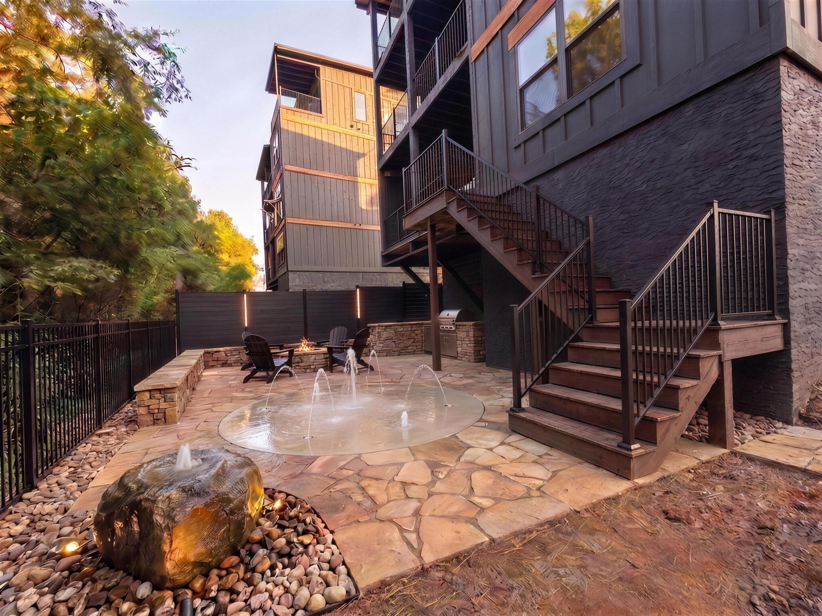 Design rendering of the same backyard with a recirculating splash pad instead of the putting green
