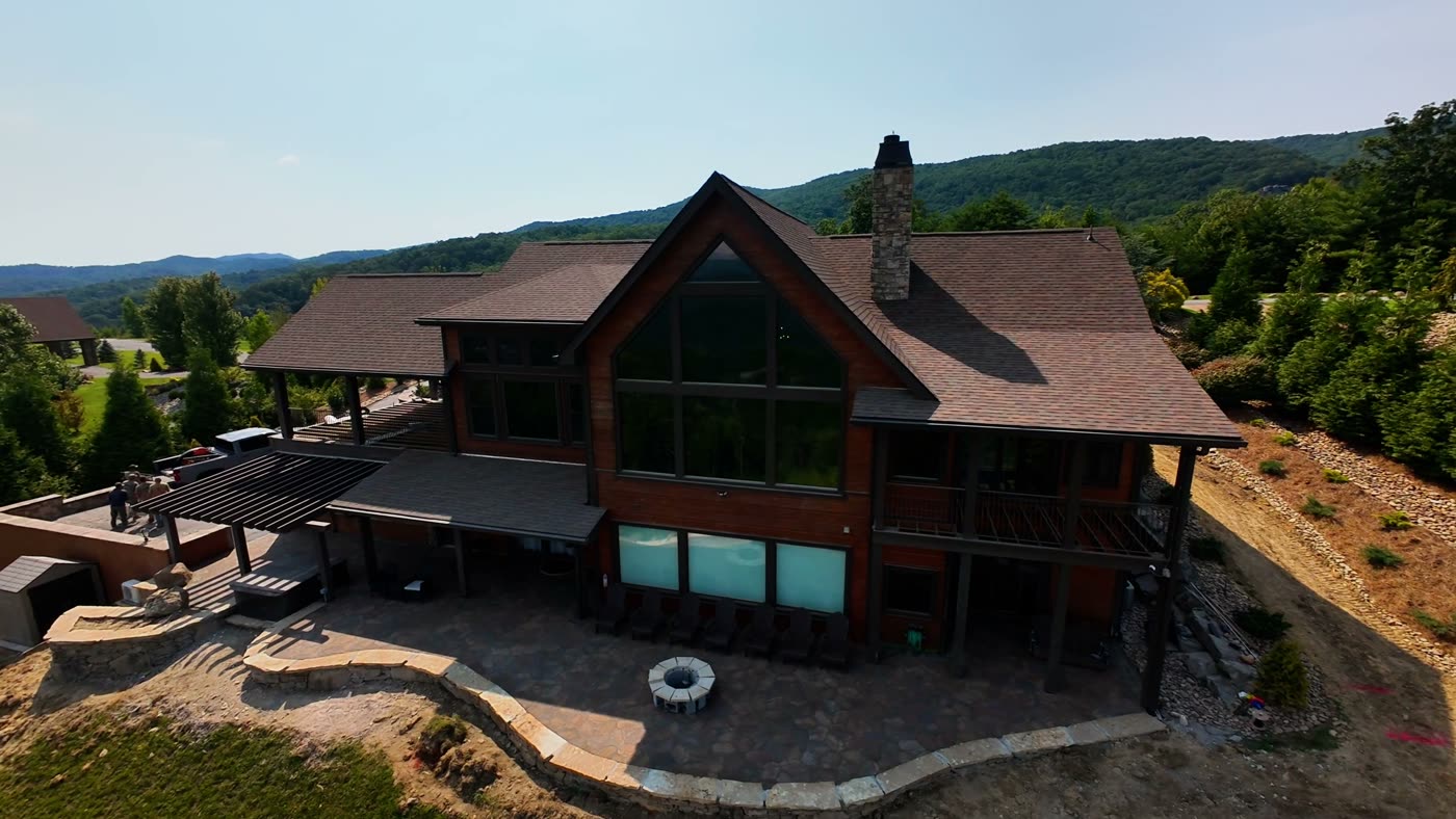 Mountain property with outdoor living set into a slope