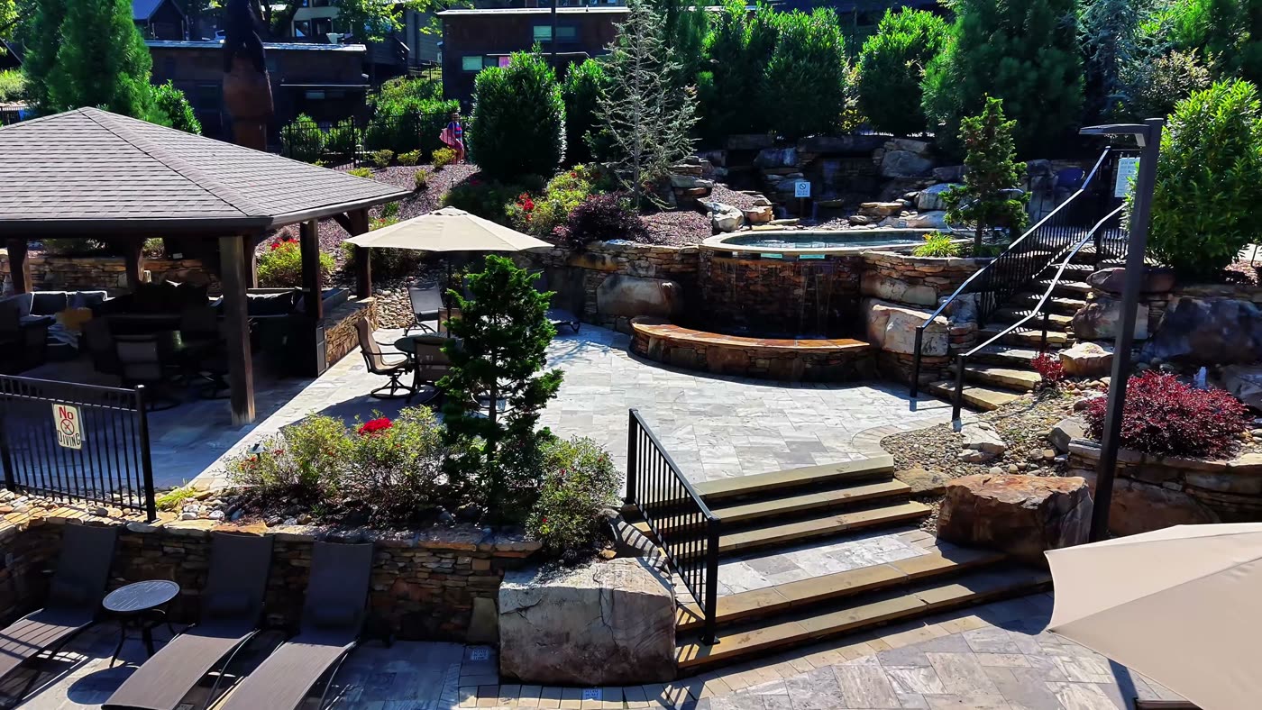 A spa fed by stacked-stone falls — Townsend
