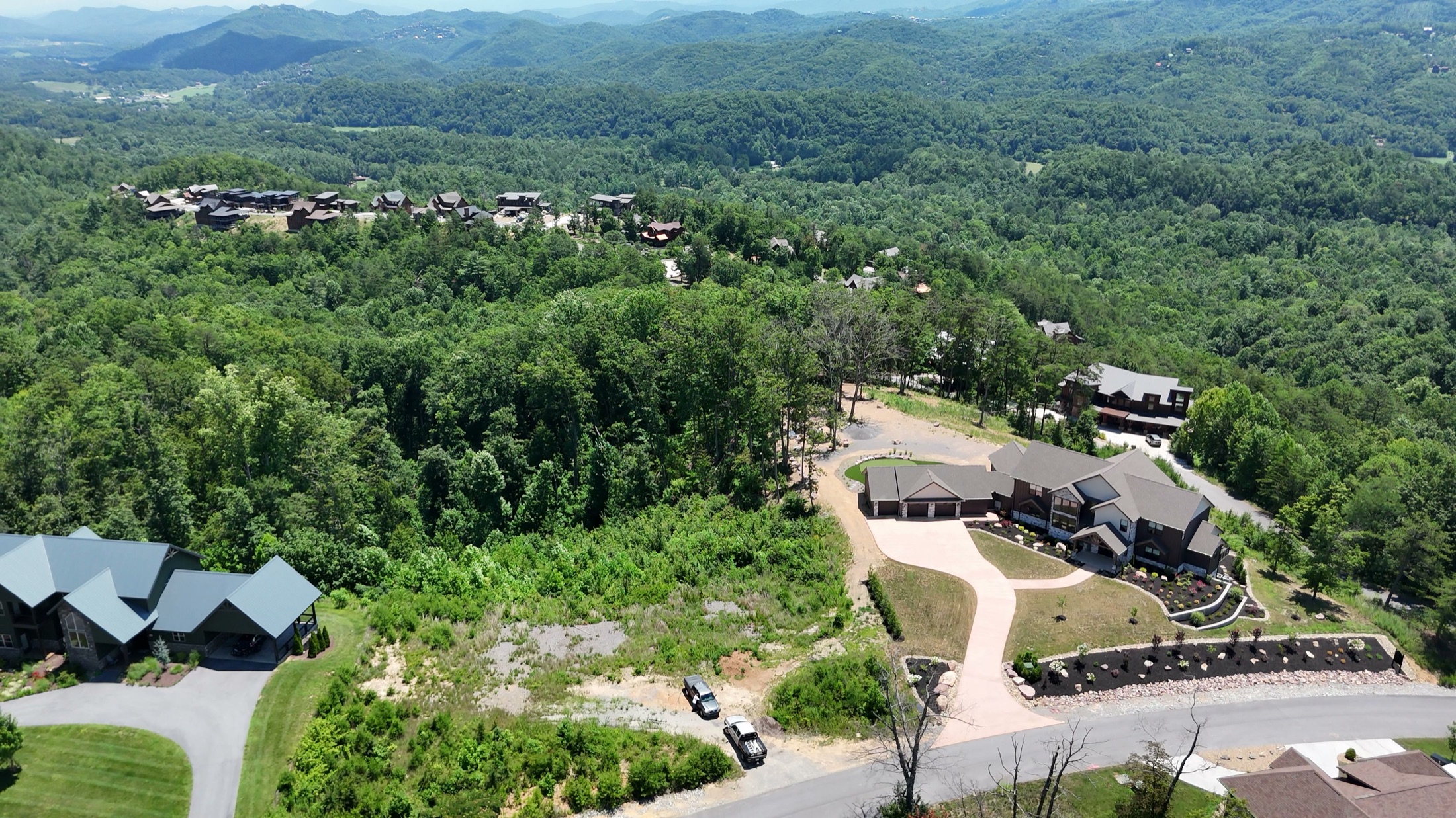 Aerial reveal of a luxury mountain home above the Smoky Mountains